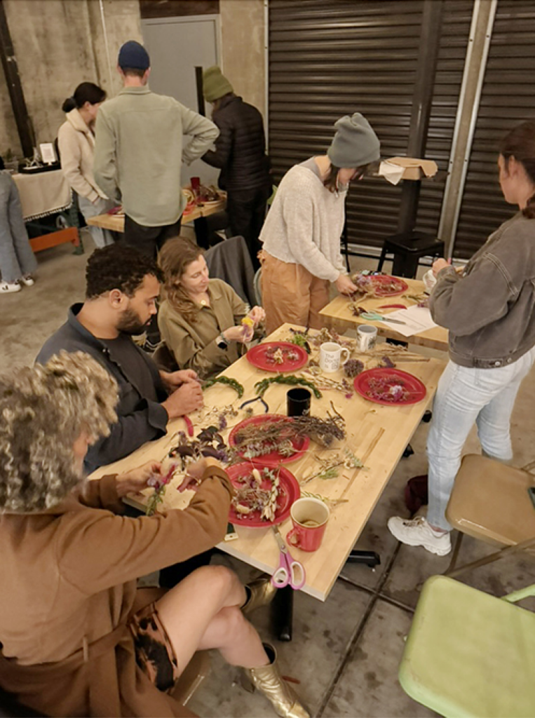 Holiday wreath making at the December 2024 Revival Rounds meetup at Two Pitchers Brewing in Oakland, CA